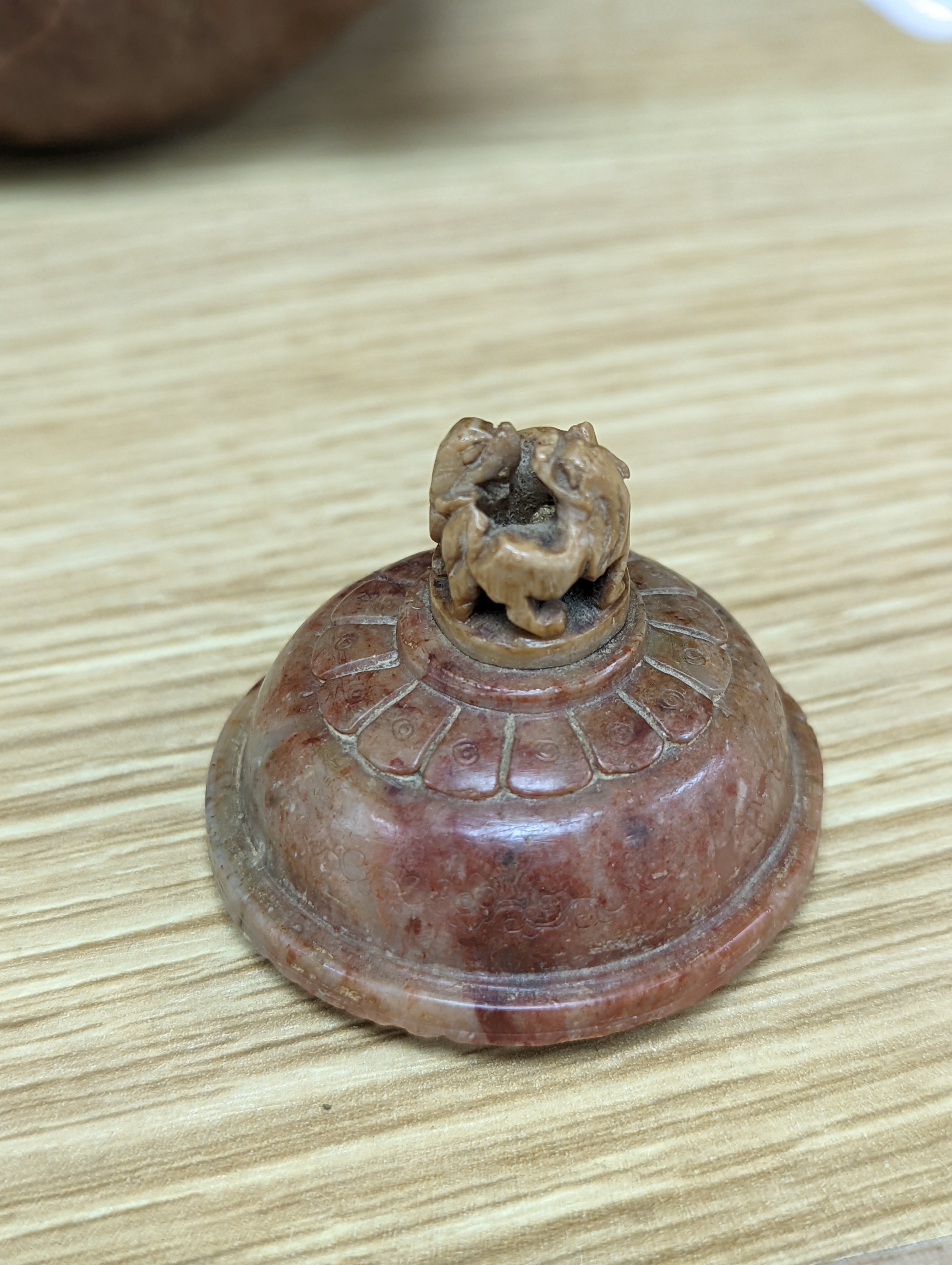 Three Chinese Yixing teapots and a carved soapstone teapot tallest 12cm